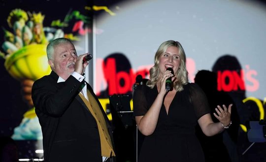 Two members of Jumbo Ensemble performing on stage