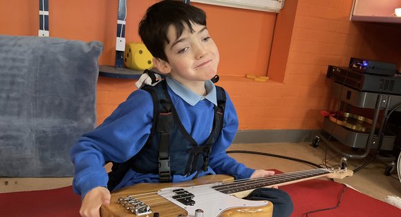 Reuben with electric guitar