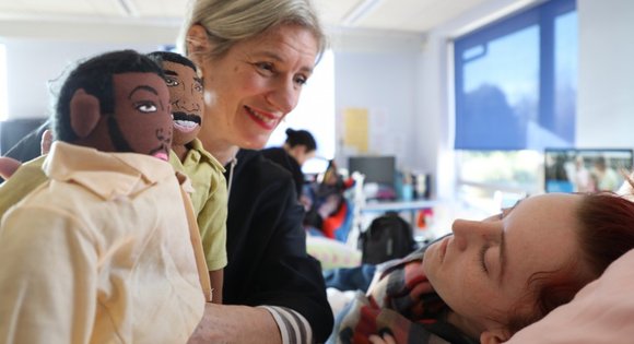 Sex Factor teacher with anatomy dolls
